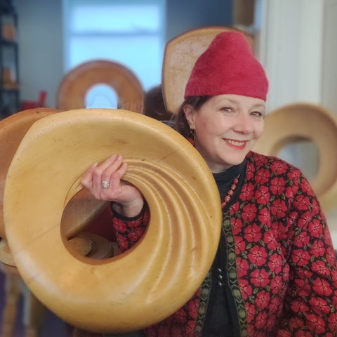 Lina Stein sitting with millinery retreat blocks