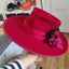Lina Stein student work in red felt with corsage  trimming